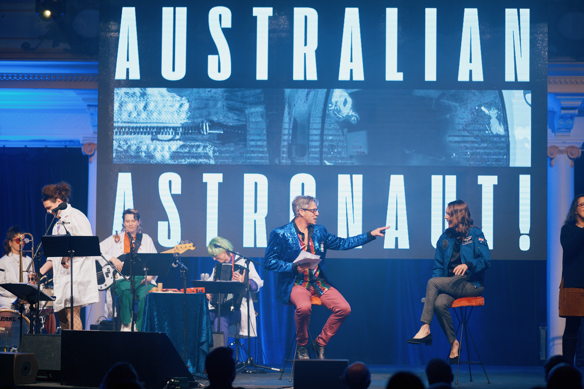 People on a stage at an event.