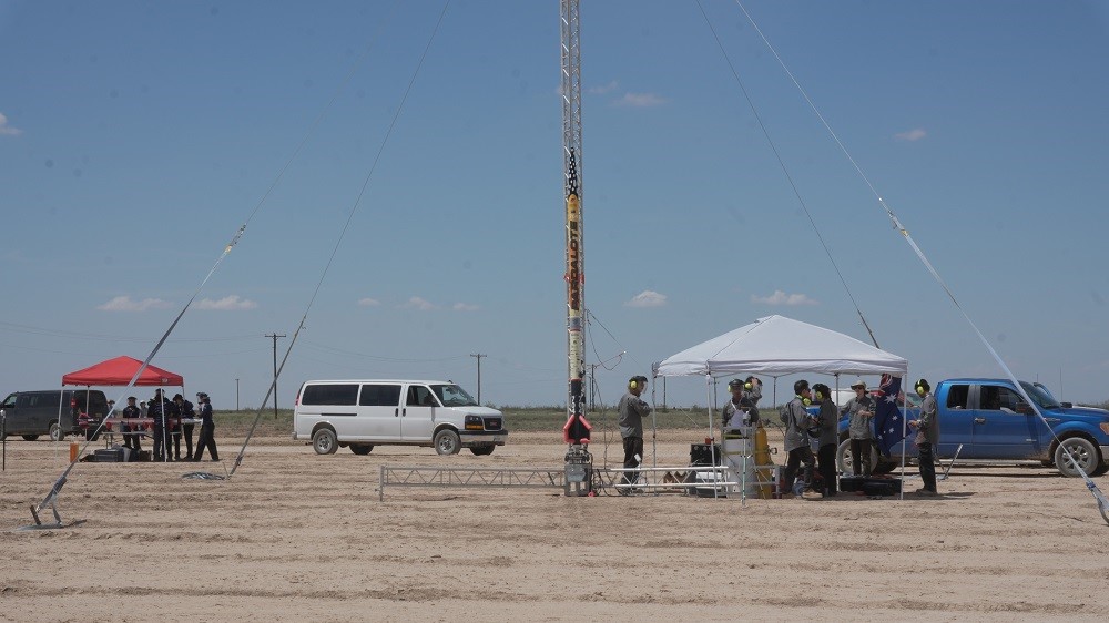 A rocket being launched from a site