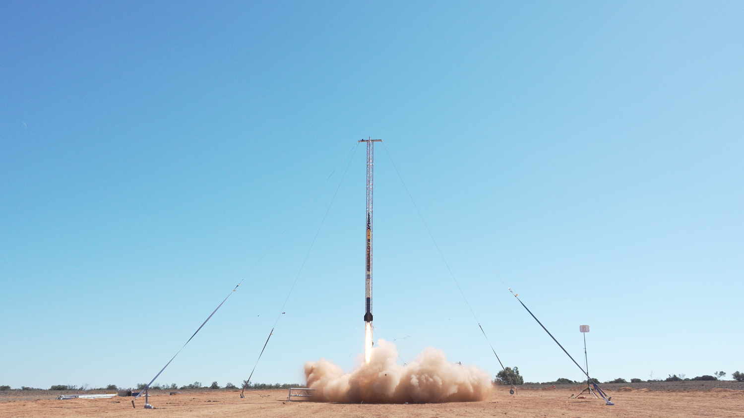 A rocket being launched from a site