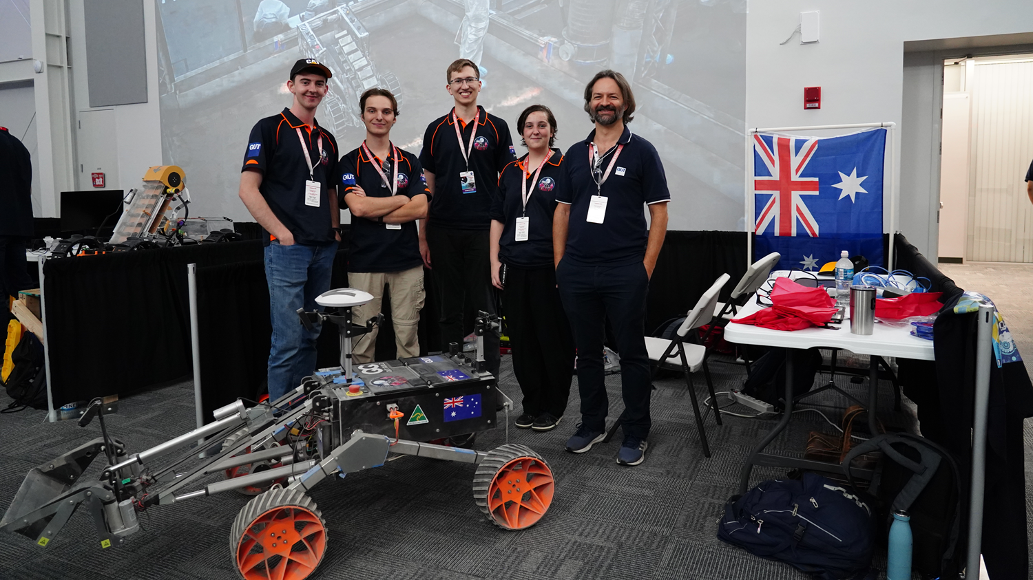 QUT ROAR (Remote Off-world Autonomous Robotics) team members along with their academic mentor  Associate Professor Thierry Peynot