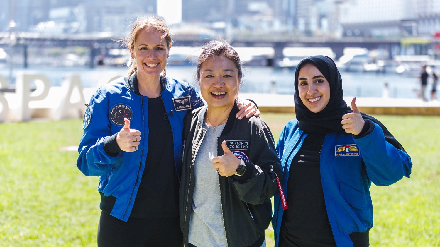 Australian astronaut Katherine Bennell-Pegg with two other astronauts from South Korea and United Arab Emirates