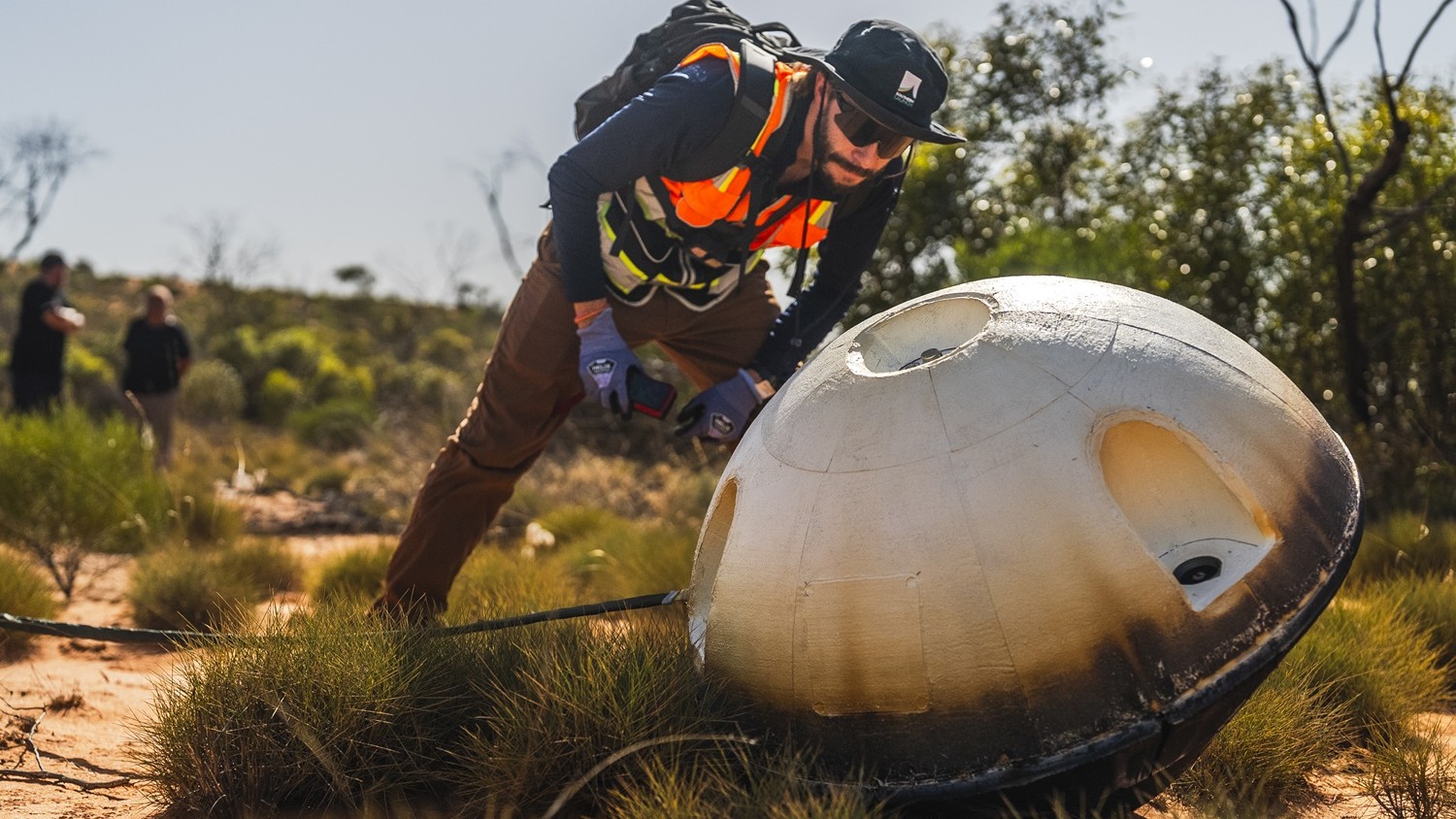 Varda Space Industries recovery lead Brandon Amat securing the W-5 capsule. Photo by William Godward