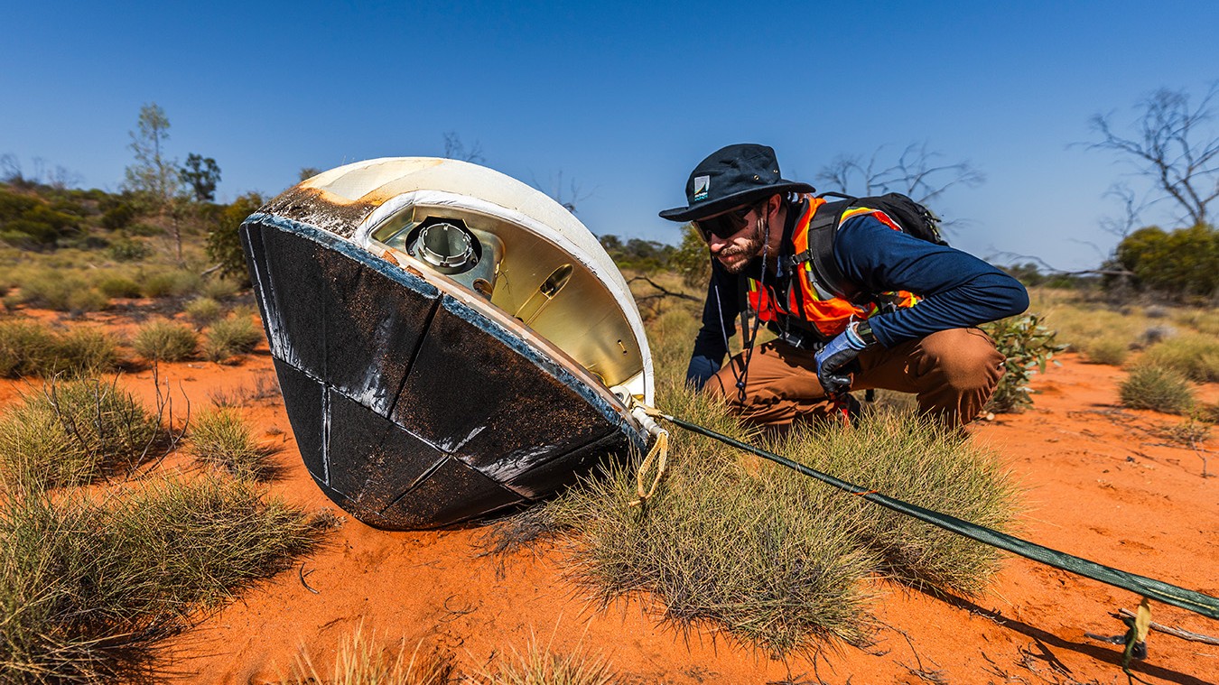 Varda Space Industries recovery lead Brandon Amat securing the W-5 capsule. Photo by William Godward