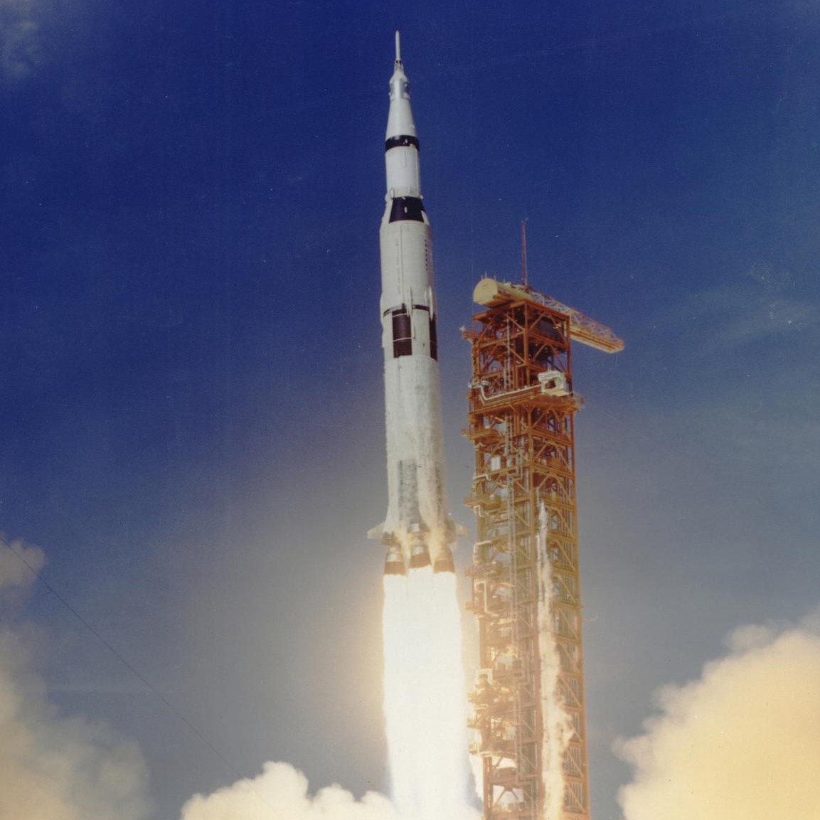 The Apollo-11 mission thunders off the launch pad on its way to the first Moon landing. The powerful thrust of the Saturn-V rattled the windows of the Launch Control Centre almost 5km away. Credit: NASA