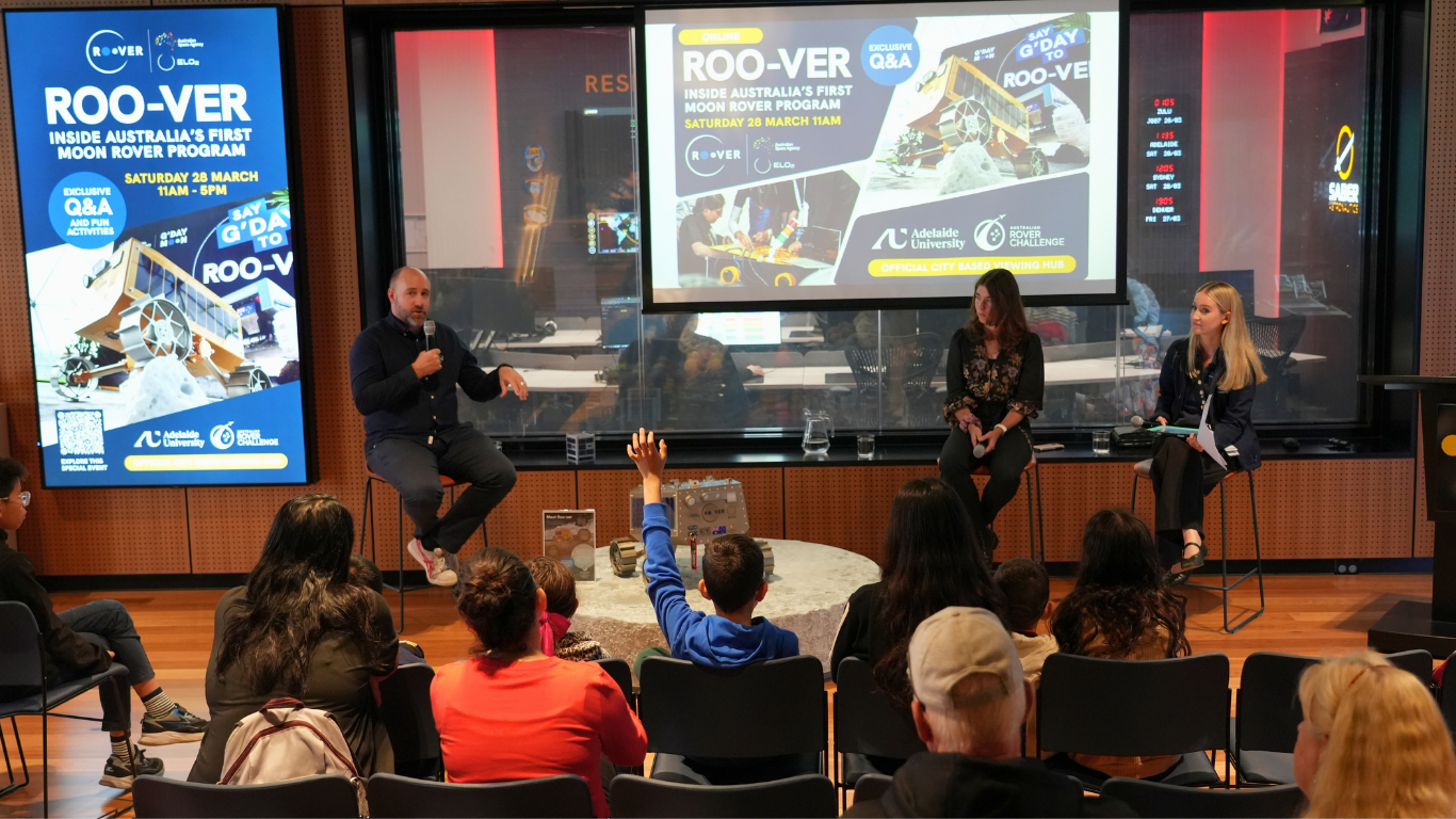 Young space enthusiast asking a question at a Roo-ver event