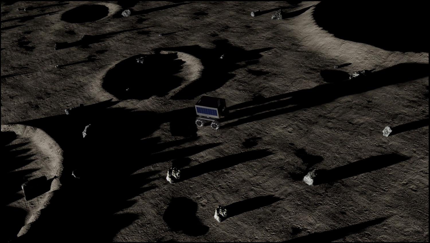 A lunar rover with detailed surface craters in LunarSim (Element Robotics).jpg