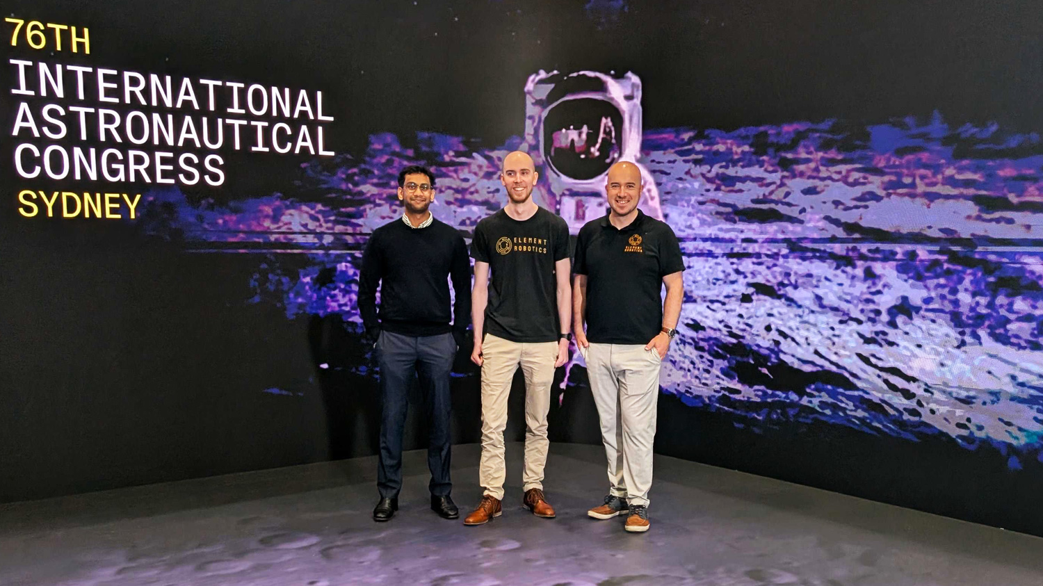A group photo of Munir and Tenzin at IAC 2025 (Element Robotics)