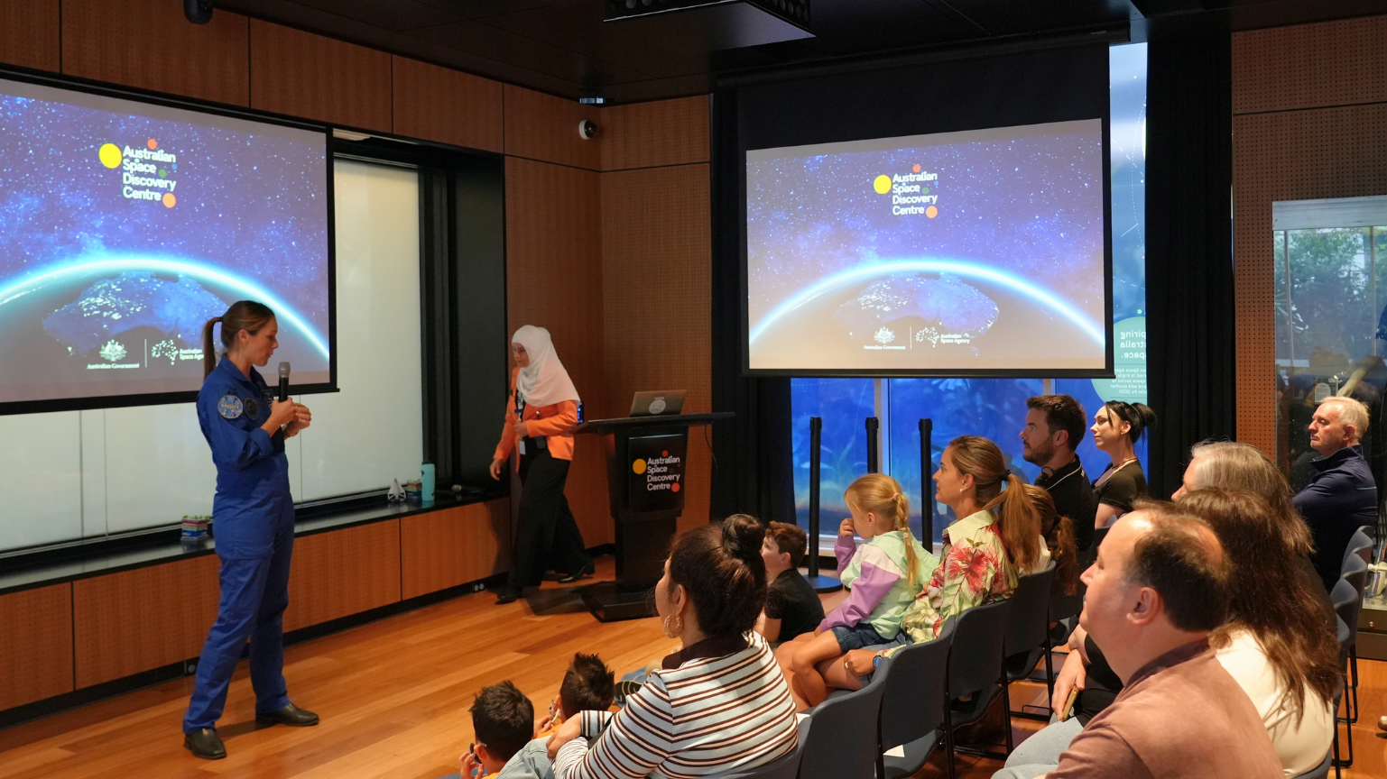 Australian astronaut Katherine Bennell-Pegg with young space enthusiasts at an event.