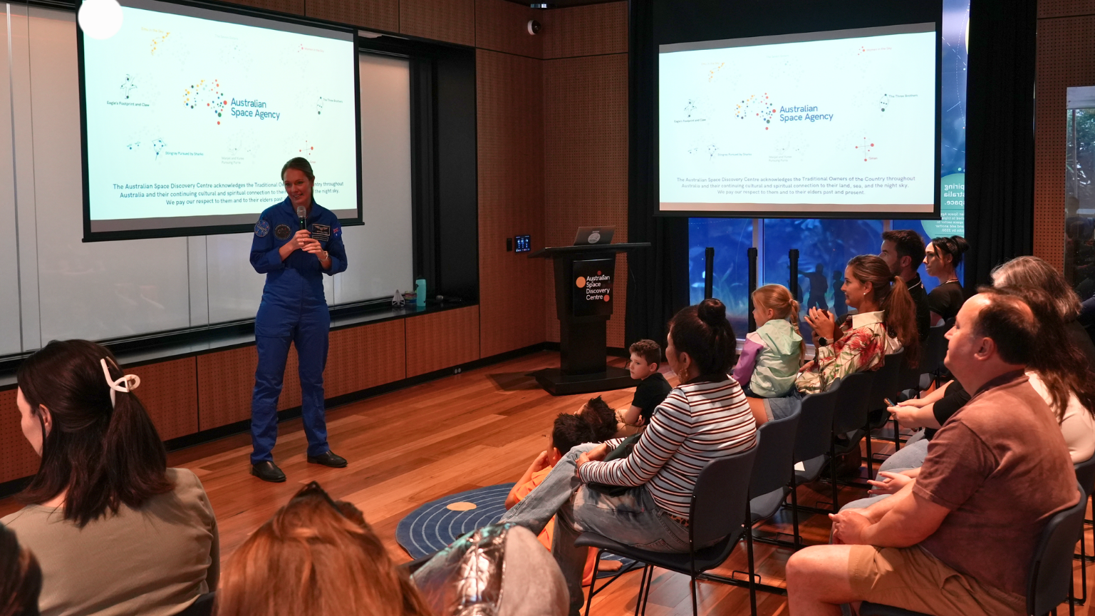 Australian astronaut Katherine Bennell-Pegg with young space enthusiasts at an event.