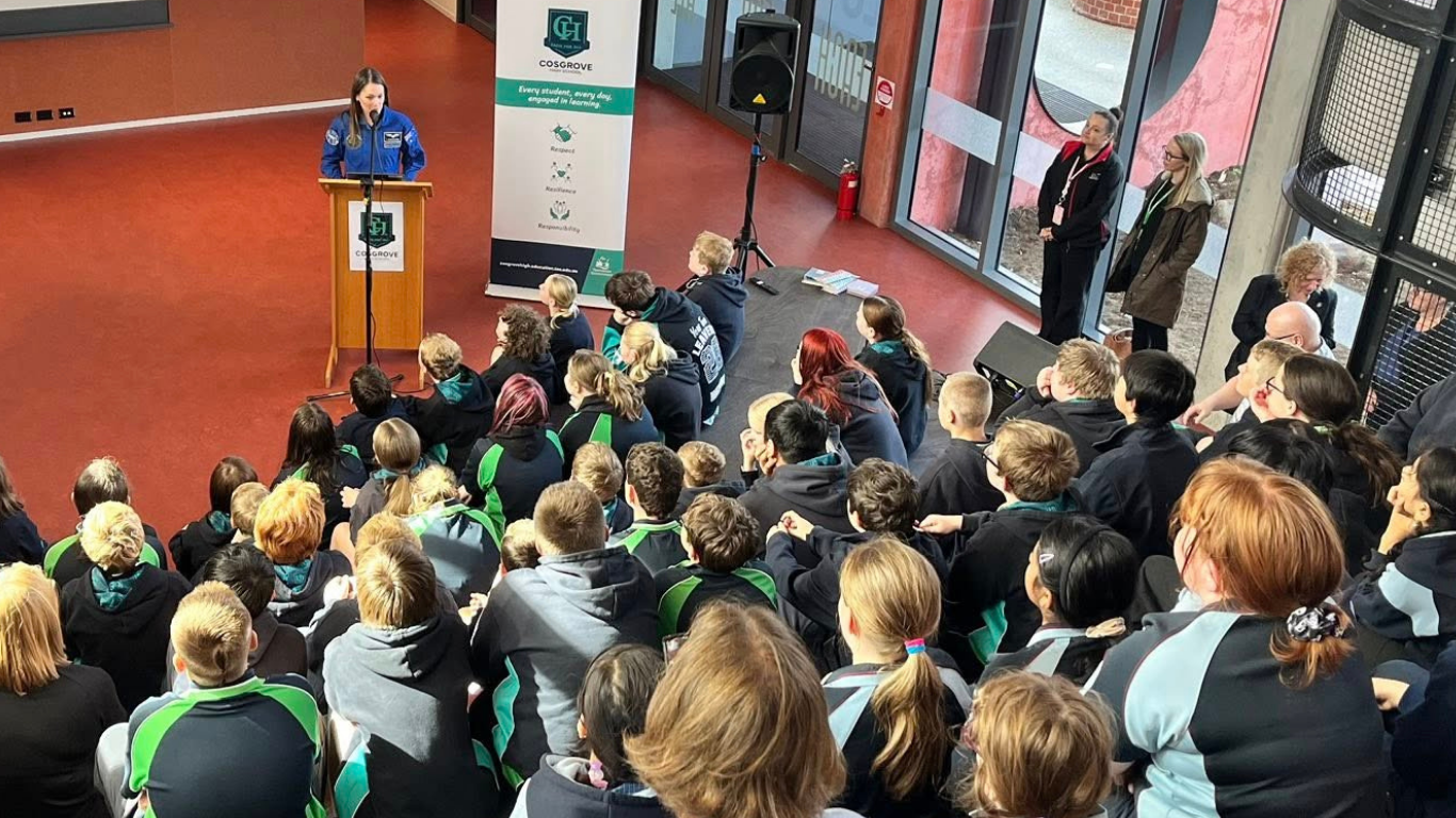 Australian astronaut Katherine Bennell-Pegg with students at a school in Tasmania.