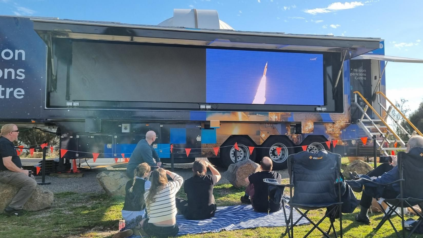A group watching the Artemis II launch with The Australian National University Quantum Optical Ground Station (QOGS) team at the Mt Stromlo Observatory. 