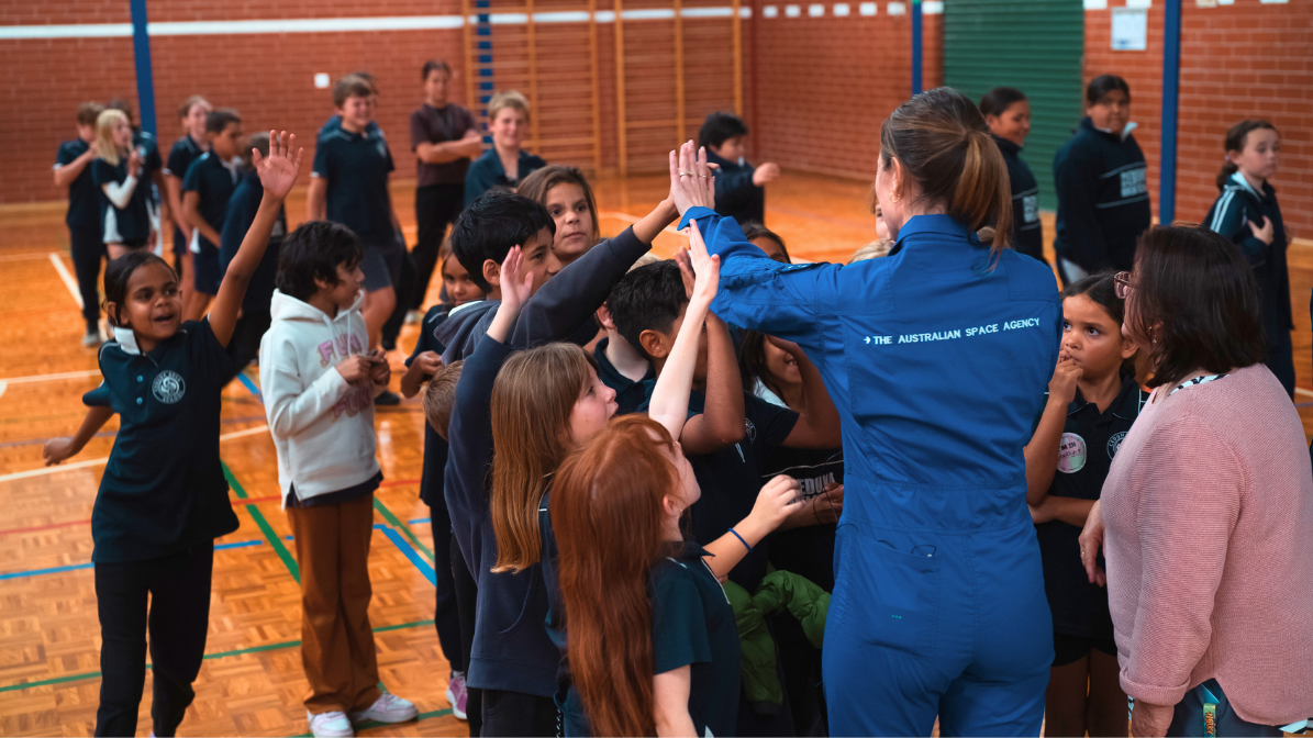Australian astronaut Katherine Bennell-Pegg with young space enthusiasts at an event