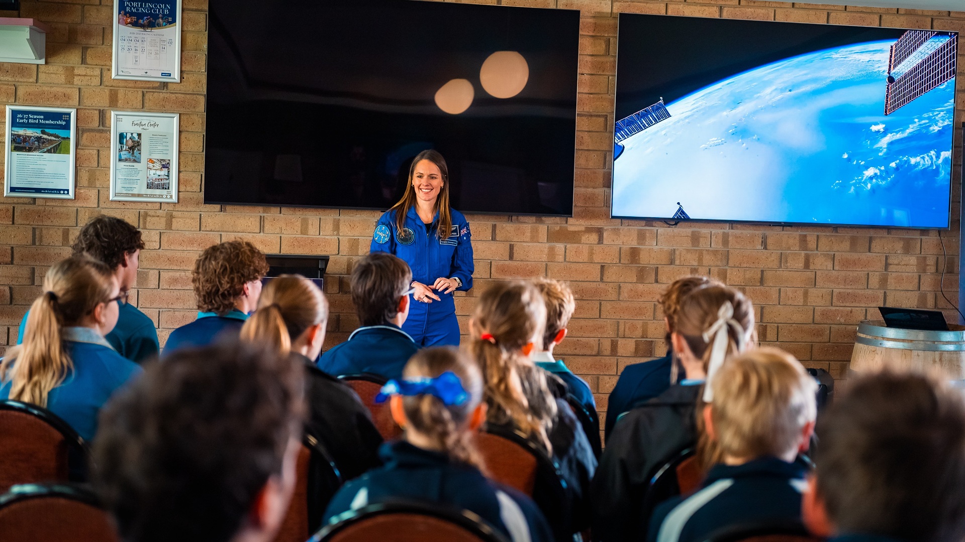 Australian astronaut Katherine Bennell-Pegg with a young space enthusiasts at an event