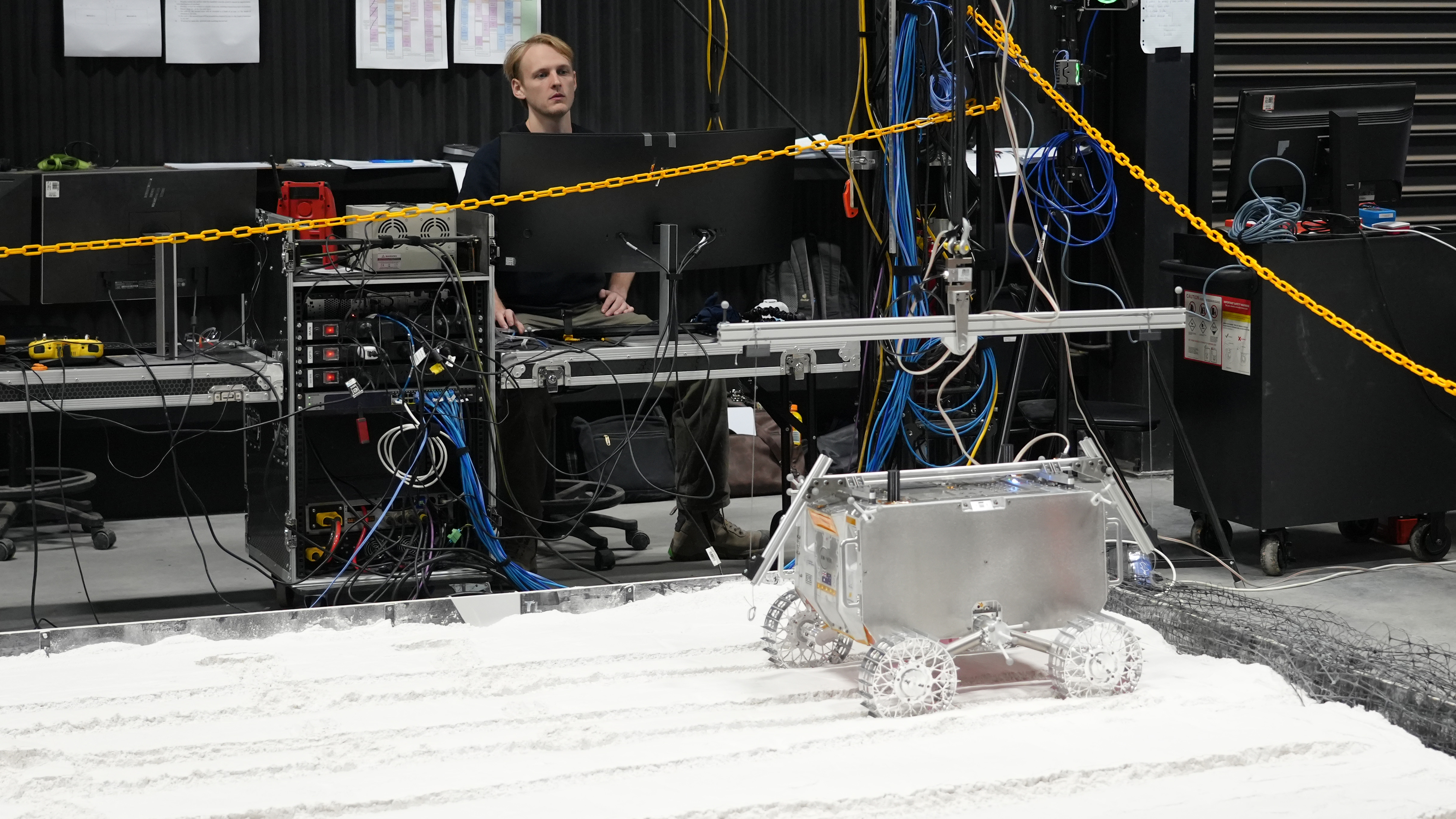 a new Roo-ver prototype that is Developed by the ELO2 consortium in partnership with the Australian Space Agency is being tested at Adelaide University's EXTERRES CRATER Facility