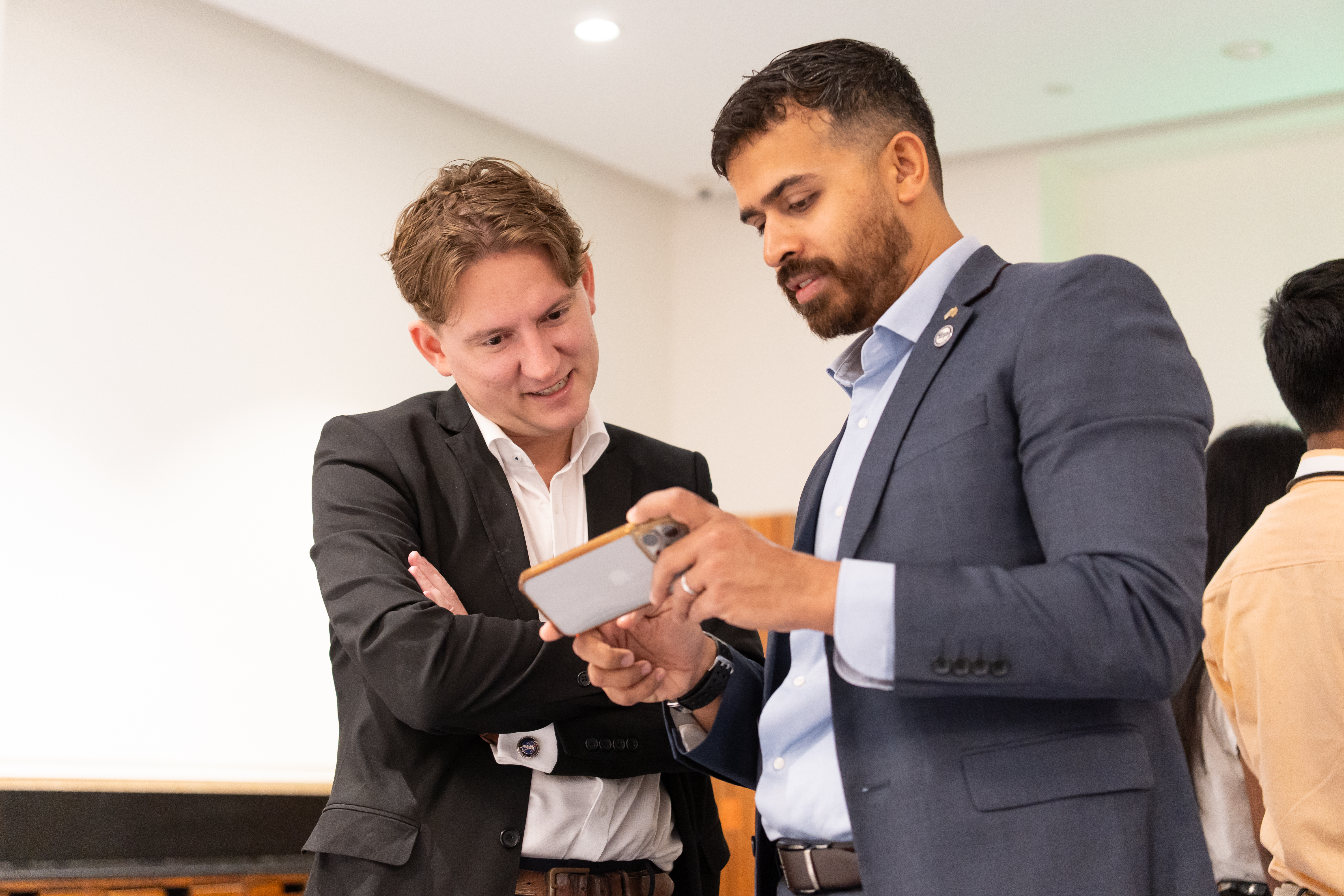 Domnic Shumilin speaking with attendee to the Australia-India Networking Breakfast.