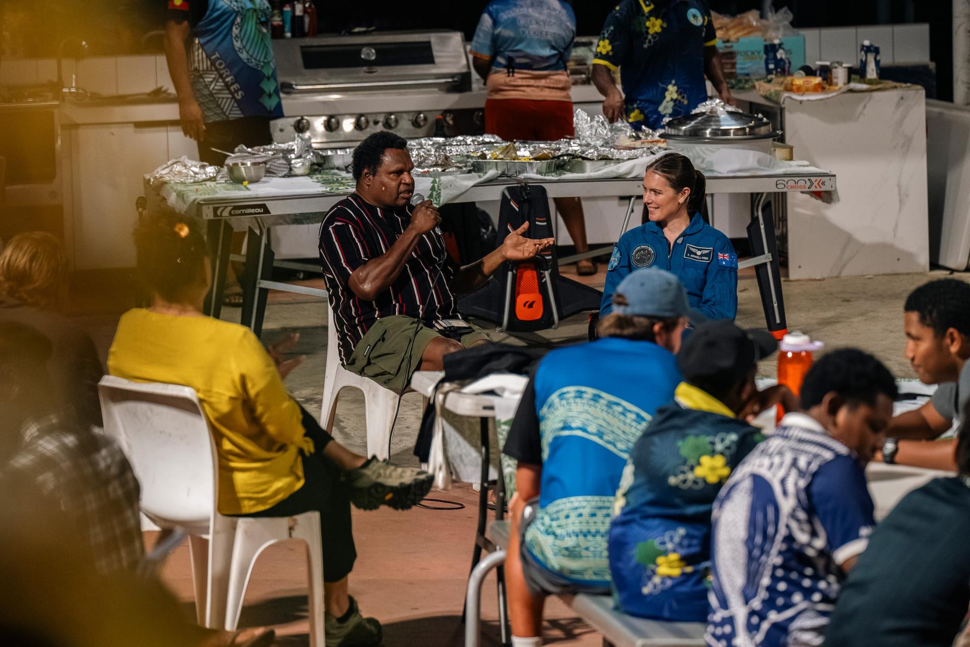 Aussie astronaut Katherine Bennell-Pegg with a community leader from the Torres Strait