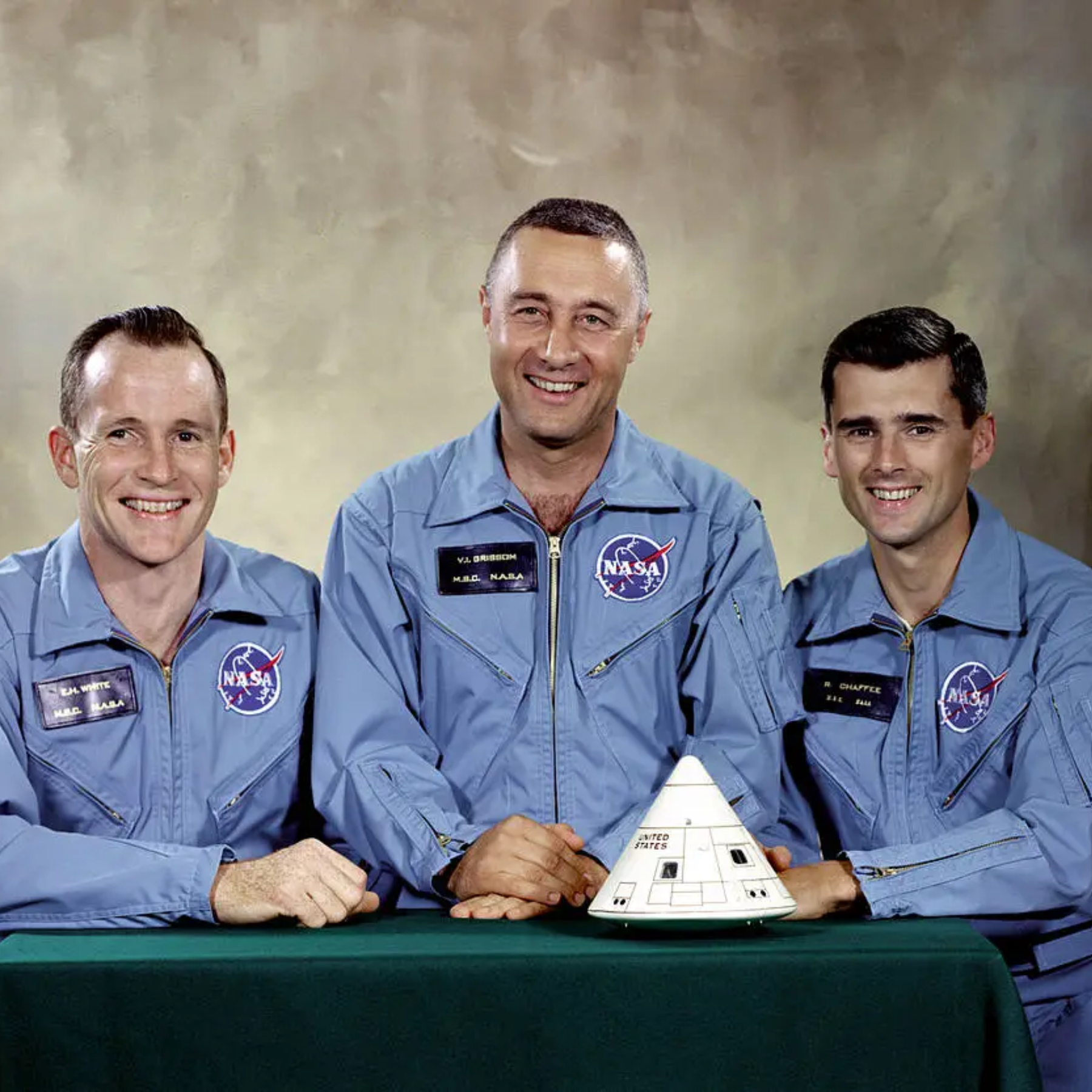 The crew of the Apollo-1 mission posed for their official mission portrait in their heavy cotton blue flight suits Credit NASA