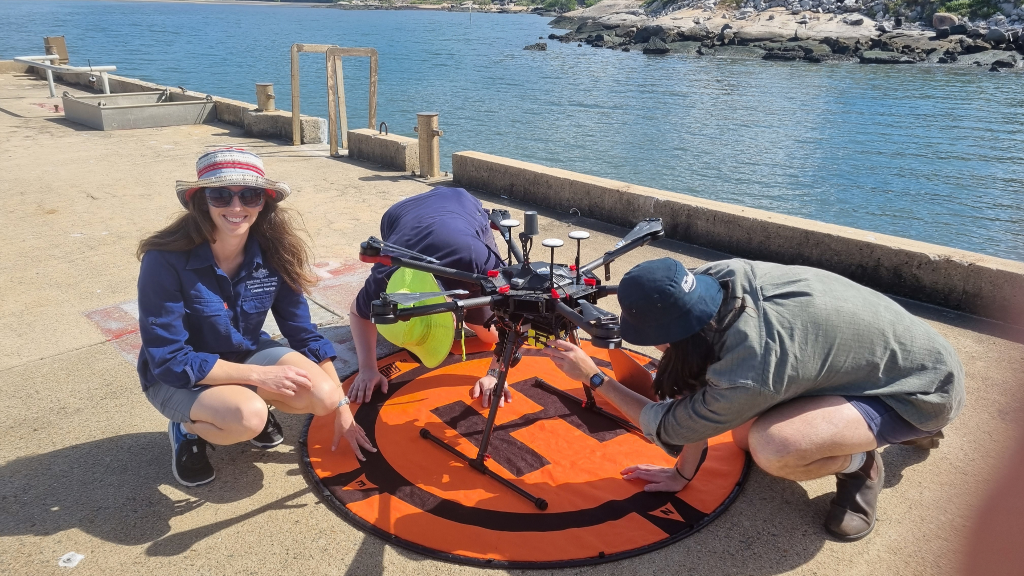 Anna Riddell with a Demonstrator project for testing positioning solutions on a UAV in Townsville at the AIMS facility. Credit: Anna Riddell, Geoscience Australia