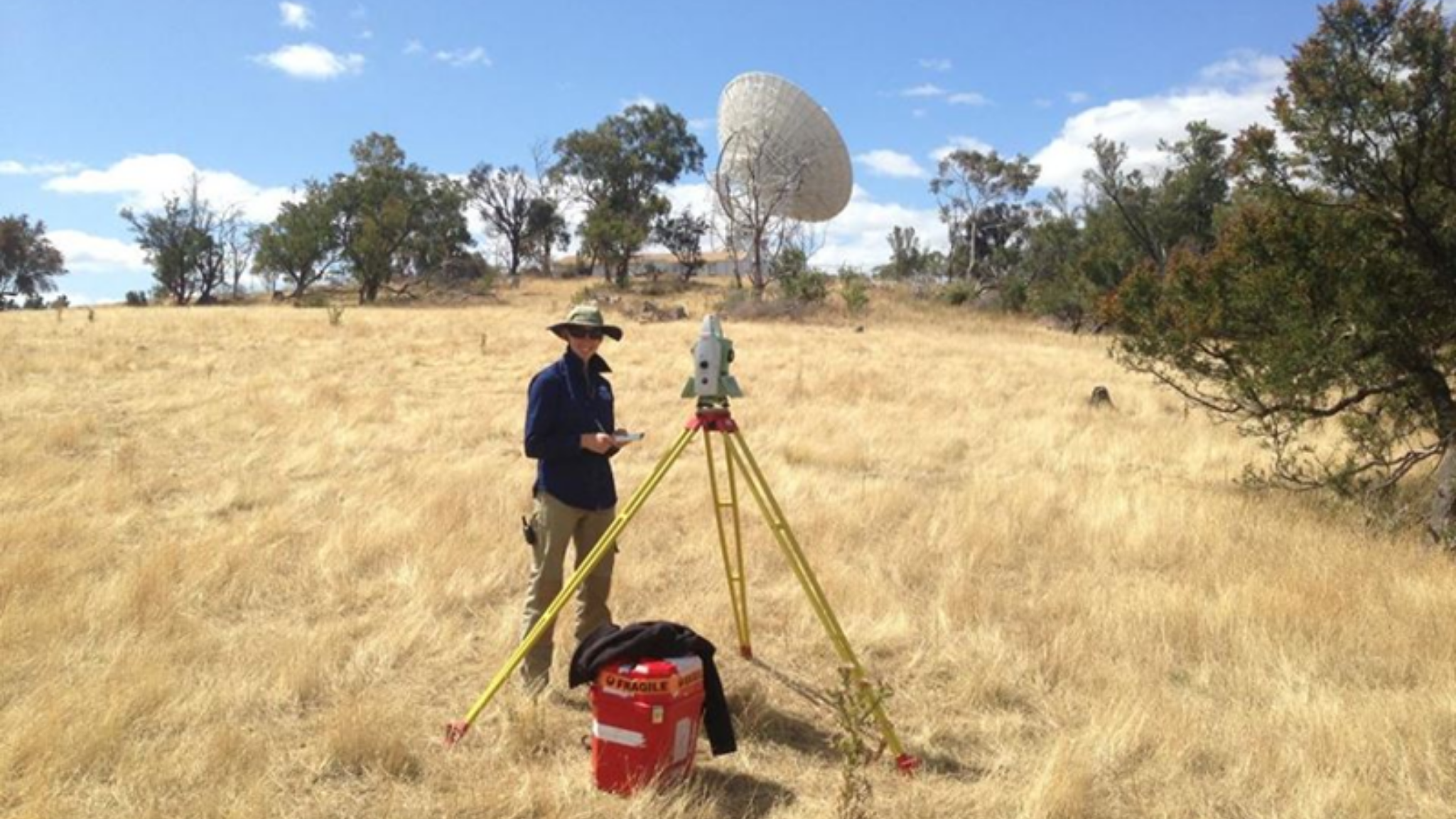 Anna Riddell undertaking fieldwork for the survey of the radio telescopes at the Mt Pleasant Observatory, Hobart. Credit: Ryan Ruddick, Geoscience Australia