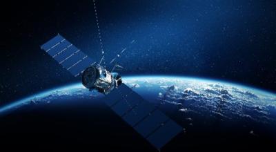 A satelite in space with the Earth in the background