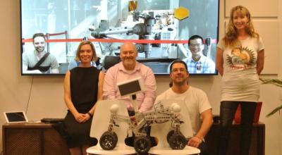 The Akin team, in Australia and USA, appear in both person and virtually. Both sides of video call are displaying their robots