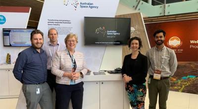 Photo of Australian Space Agency officials at their exhibition stand.