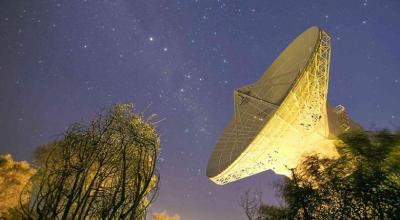 A deep space antenna with the night sky behind
