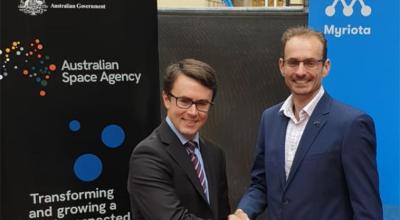 Photo of Myriota CEO and Australian Space Agency's Deputy Head shaking hands