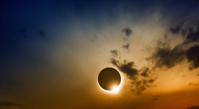 Twilight sky showing a partial solar eclipse