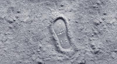 Boot print on moon with gday moon text within boot print