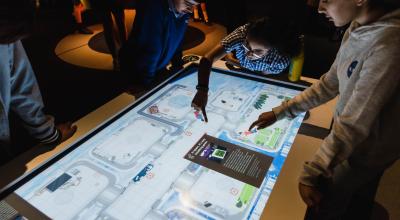 School kids interacting with screen