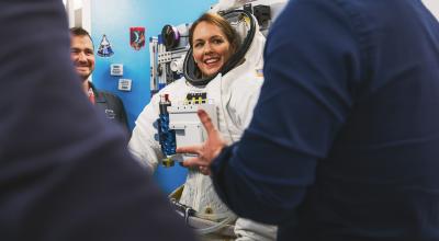 Person's headshot in an astronaut uniform