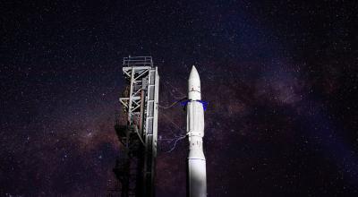 Rocket on launch pad at night 