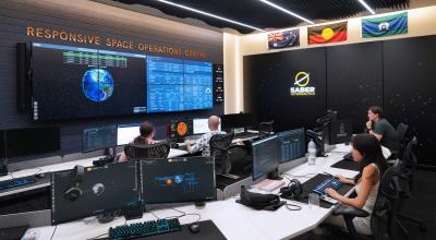 A group of people in a mission control.