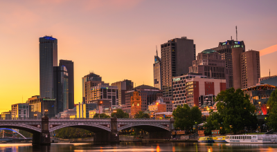 Melbourne, Victoria, Australia - January 28, 2017 : Sunset over skyscrapers of Melbourne downtown, Princess Bridge and Yarra River. Long exposure By Nick Fox