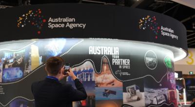 Visitors at the Australian Space Agency stand at IAC 2025