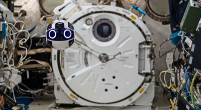 A free-flying robot through the ISS module. Credit: JAXA