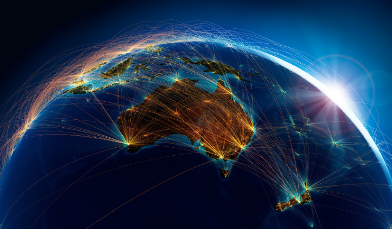 Image of Australia from space with beams of light connecting across continents.