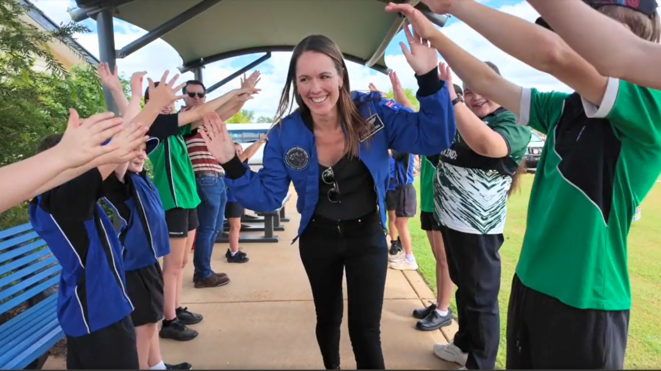 Katherine Bennell-Pegg with students at Charlesville