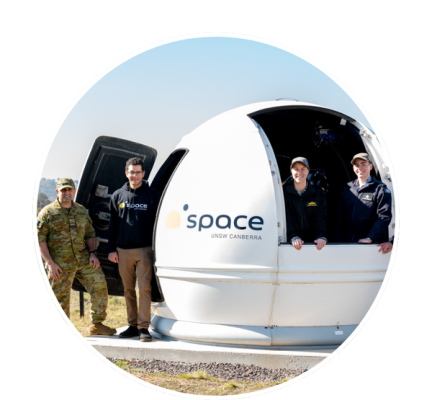 Defence and UNSW personnel with UNSW Canberra Space’s Viper optical telescope in NSW.