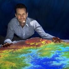 A headshot of Rohan Fisher