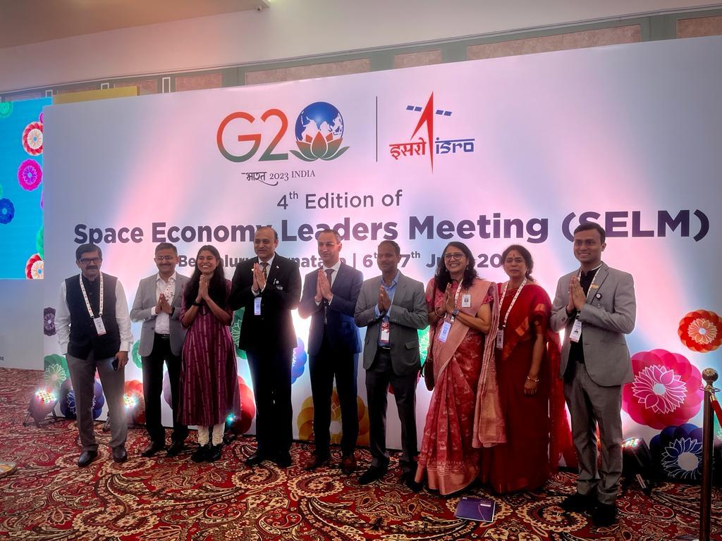 Enrico Palermo standing with a group at the G20 SELM.