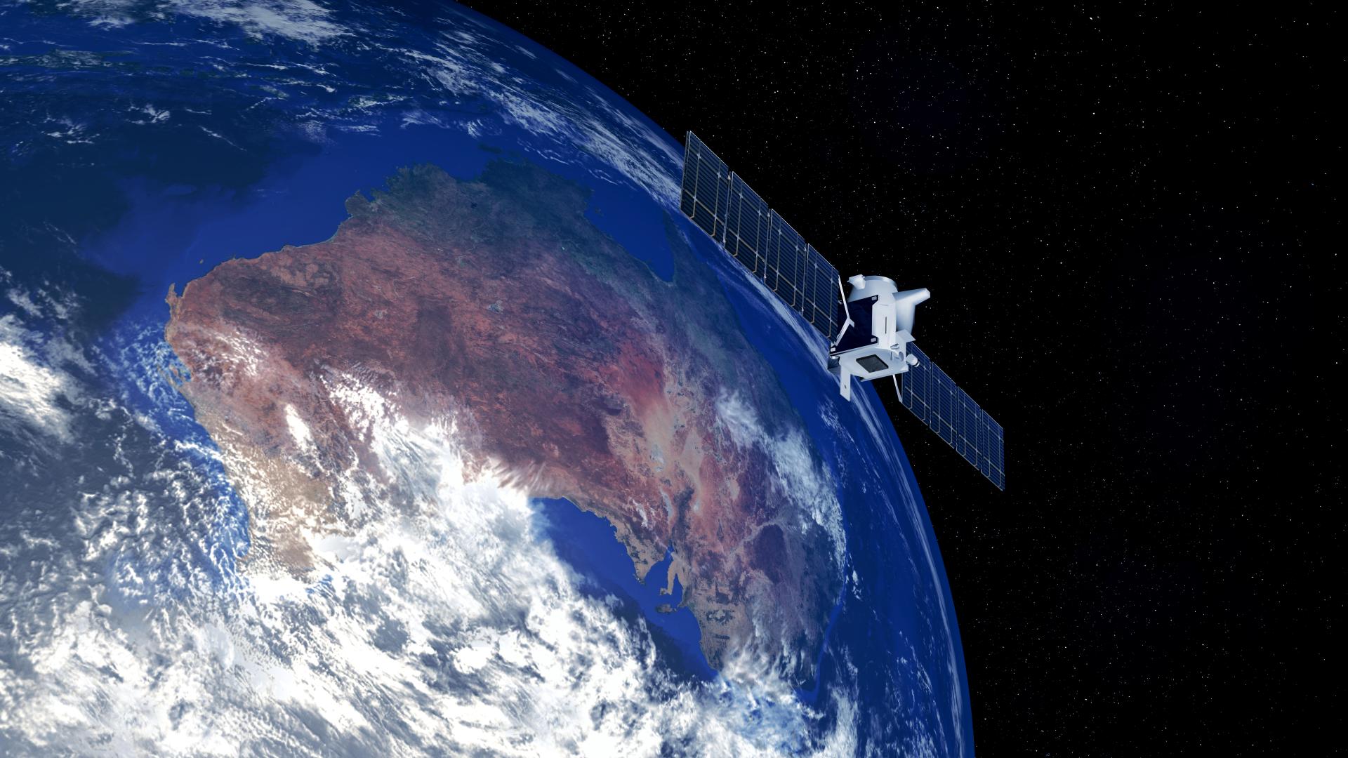 3D image of earth with deep space one spacecraft above Australia.